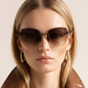 Titanium rimless sunglasses for women GRESSO Ibiza with Zeiss polarized grey lenses