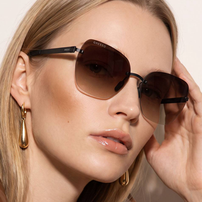 Titanium rimless sunglasses for women GRESSO Ibiza with Zeiss polarized grey lenses