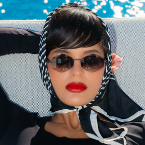 Titanium rimless sunglasses for women GRESSO Portofino with Zeiss polarized grey lenses