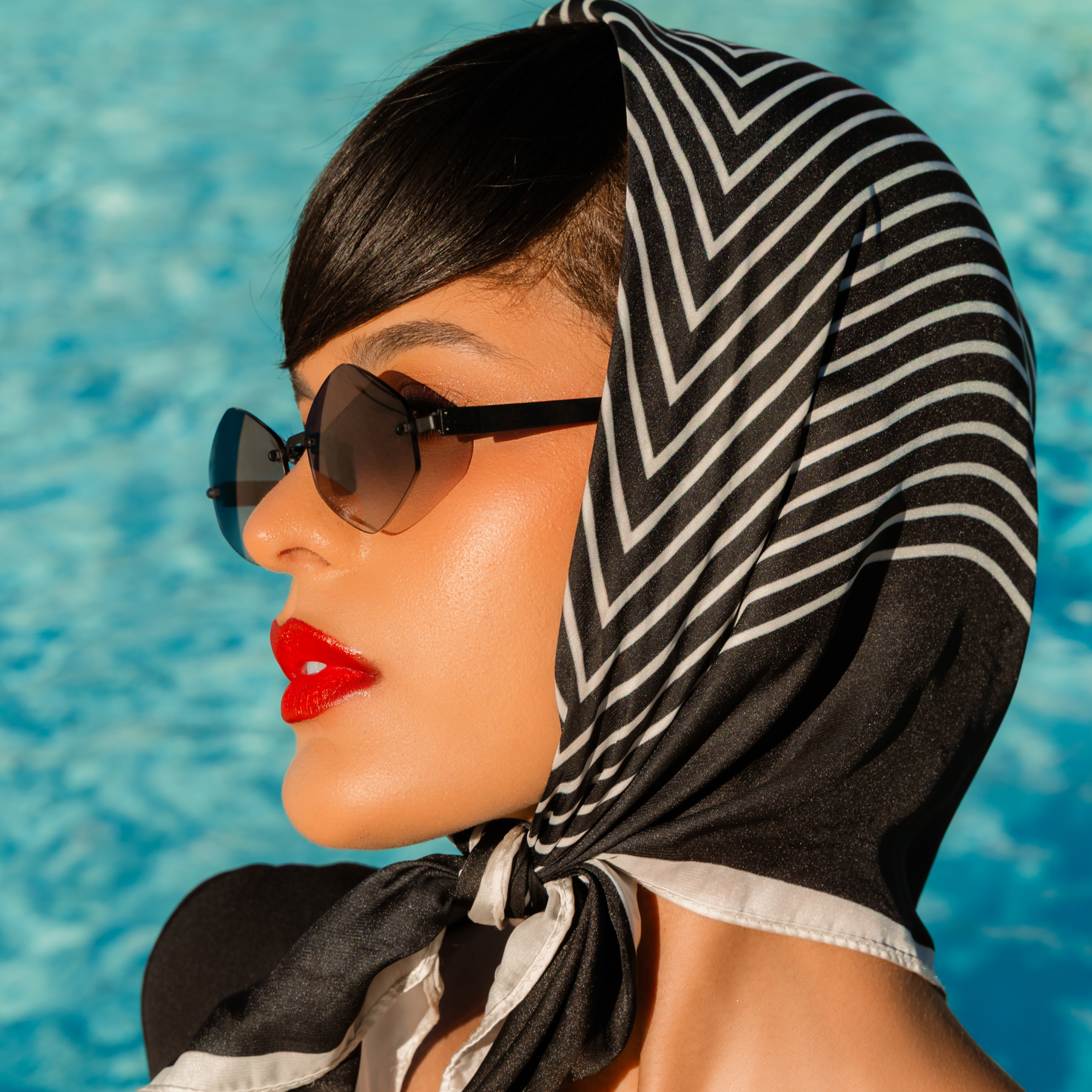 Titanium rimless sunglasses for women GRESSO Portofino with Zeiss polarized grey lenses