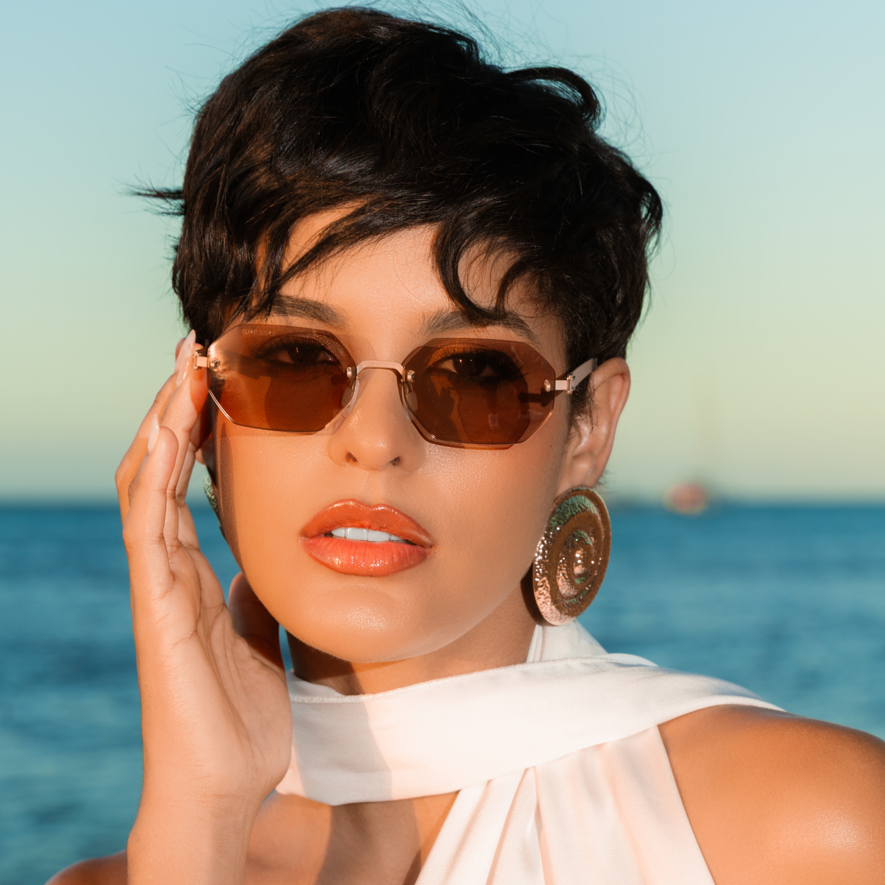 Titanium rimless sunglasses for men and women GRESSO Singapore with Zeiss polarized grey lenses