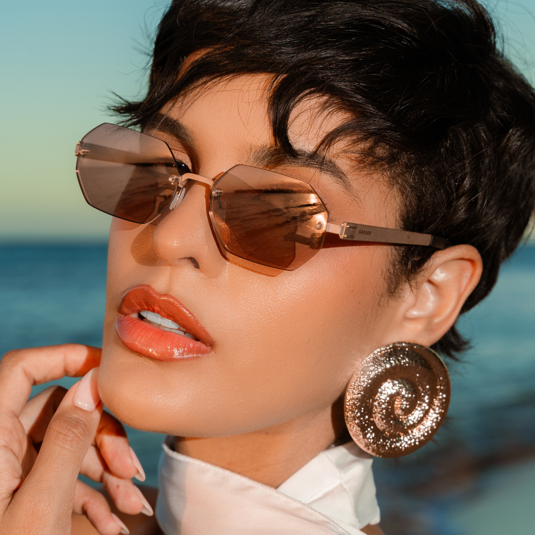 Titanium rimless sunglasses for men and women GRESSO Singapore with Zeiss polarized grey lenses