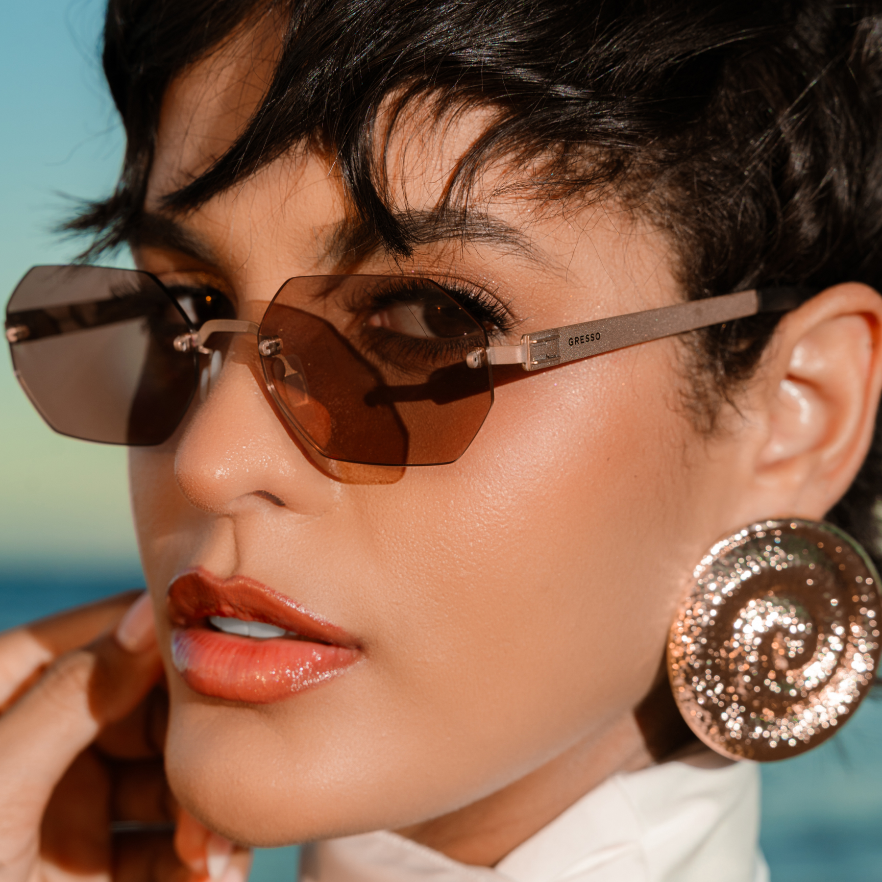 Titanium rimless sunglasses for men and women GRESSO Singapore with Zeiss polarized grey lenses