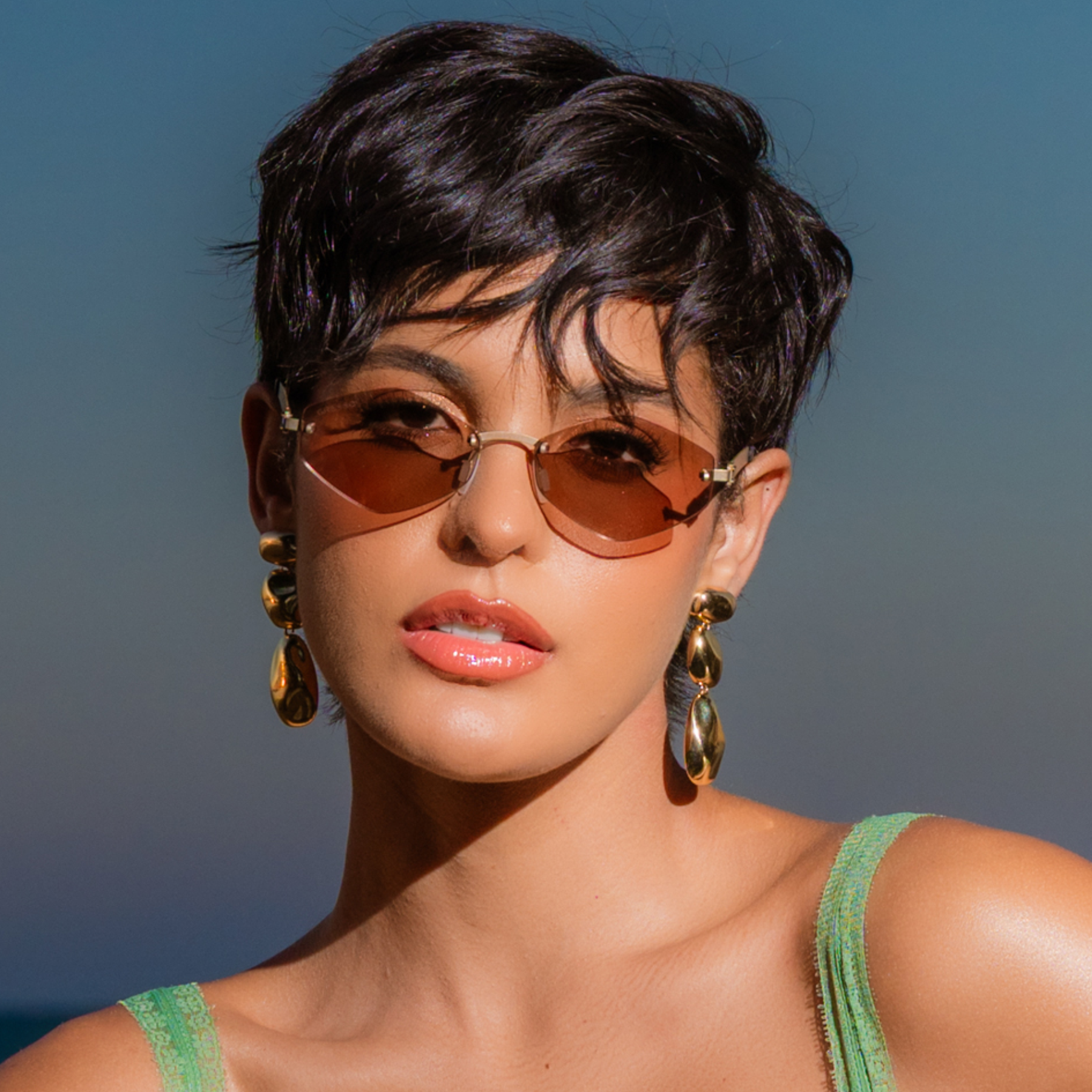 Titanium rimless sunglasses for women GRESSO Tahiti with Zeiss polarized grey lenses